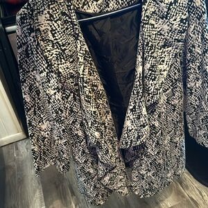 Calvin Klein Black and White ladies blazer. Size 12 Great condition